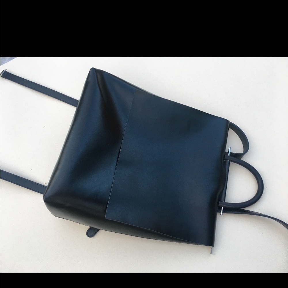 100% leather backpack